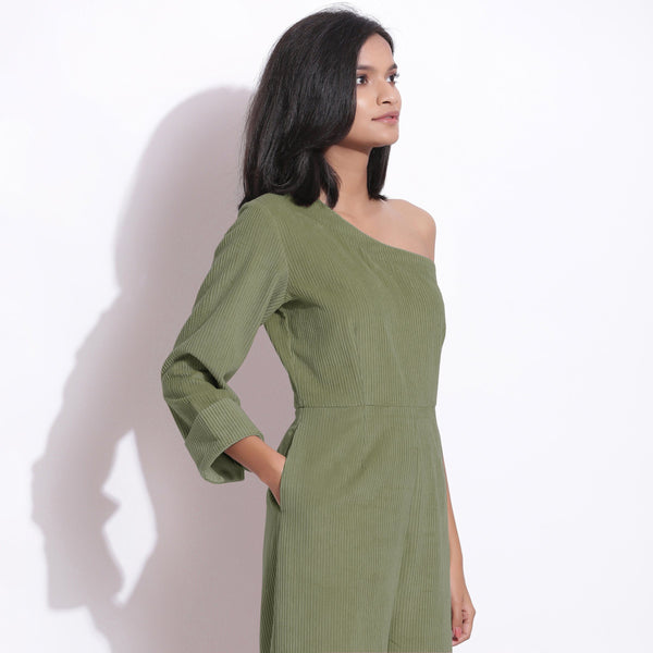 Right View of a Model wearing Sage Green Corduroy One-Shoulder Jumpsuit