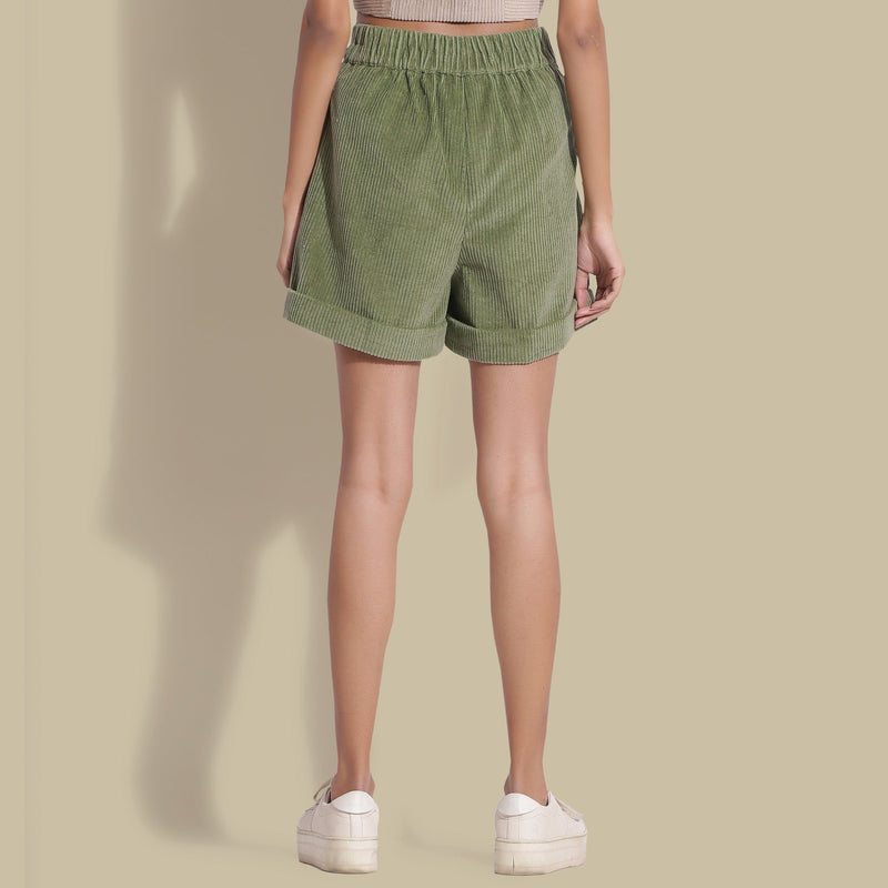 Back View of a Model wearing Sage Green Cotton Corduroy Baggy Shorts