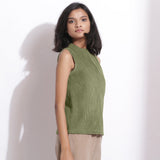Right View of a Model wearing Sage Green Cotton Corduroy Funnel Neck Top