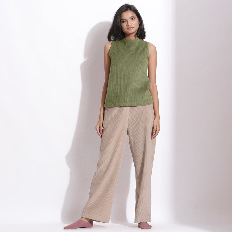 Front View of a Model wearing Sage Green Cotton Corduroy Funnel Neck Top
