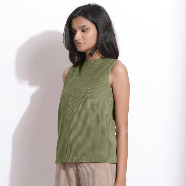 Left View of a Model wearing Sage Green Cotton Corduroy Funnel Neck Top