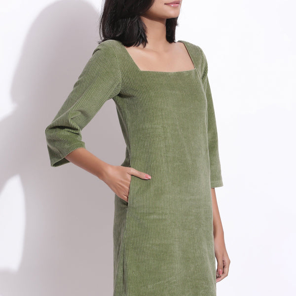 Front Detail of a Model wearing Sage Green Cotton Corduroy Square Neck Dress