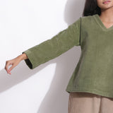 Front Detail of a Model wearing Sage Green Warm Cotton Corduroy Straight Top