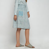 Right View of a Model wearing Sage Green Block Printed Cotton Knee Length Skirt