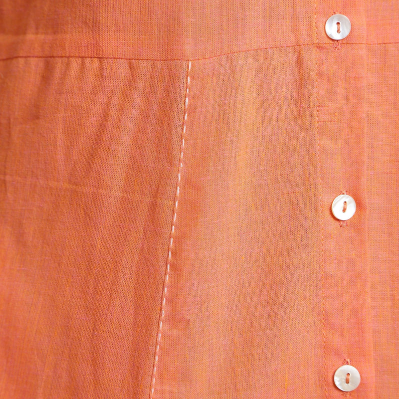 Close View of a Model wearing Salmon Pink Mangalgiri Cotton Button-Down Midi Dress