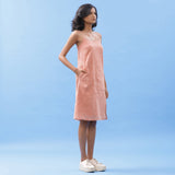 Right View of a Model wearing Salmon Pink Handspun Cotton Strap Slit Dress