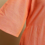 Close View of a Model wearing Salmon Pink Mangalgiri Cotton Godet Maxi Dress