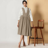 Front View of a Model wearing Sand Beige Cotton Flax Pinafore Midi Wrap Dress