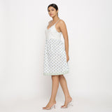 Left View of a Model wearing White Sanganeri Block Printed Cotton Camisole Dress