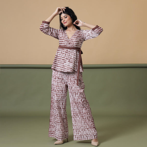 Front View of a Model wearing Sangria Wine Shibori Wrap Top and Pant Set