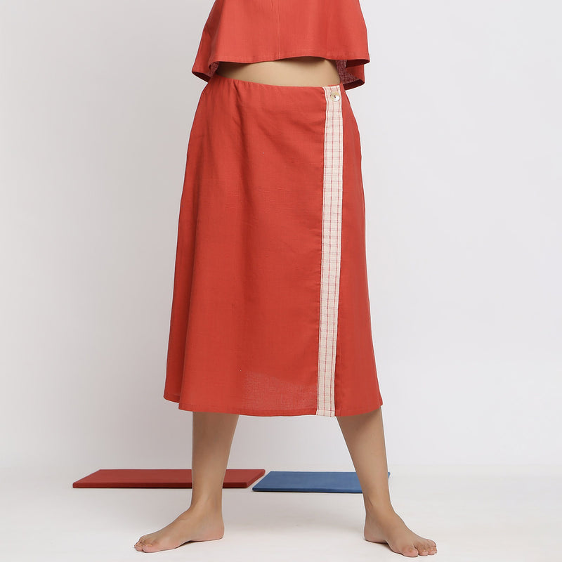 Front View of a Model wearing Vegetable Dyed Brick Red Button-Down Skirt
