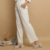 Left View of a Model wearing Undyed Elasticated Mid Rise Ecru Pant