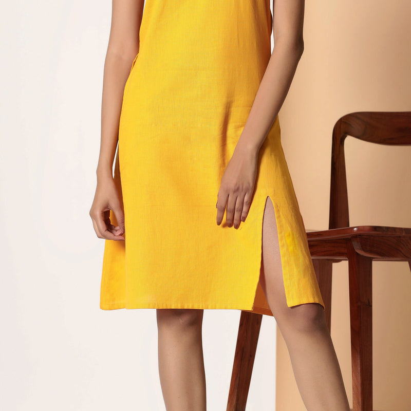 Front Detail of a Model wearing Sassy Yellow Cotton Flax Strappy Slit Dress