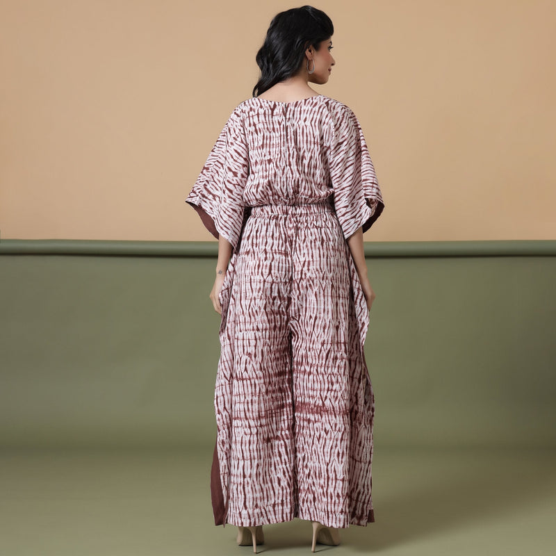 Back View of a Model wearing Maroon Tie-Dye Cotton V-Neck Kimono Sleeves Kaftan Jumpsuit