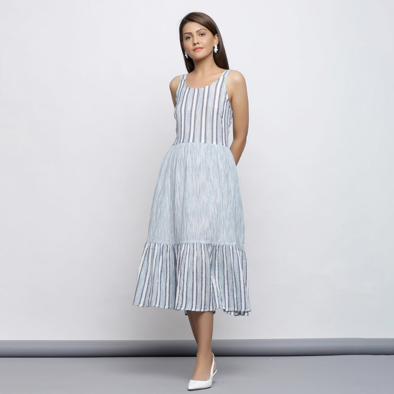 Front View of a Model wearing Sky Blue Tiered Yarn Dyed Striped Dress
