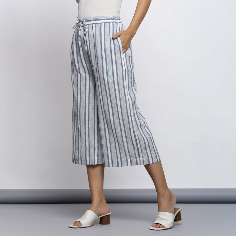 Left View of a Model Wearing Sky Blue Yarn Dyed Cotton Culottes