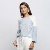 Left View of a Model wearing Sky Blue Yarn Dyed Cotton Straight Top