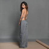Left View of a Model wearing Slate Grey Handspun Cotton High-Rise Wide Legged Pant