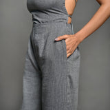 Left Detail of a Model wearing Slate Grey Handspun Cotton High-Rise Wide Legged Pant