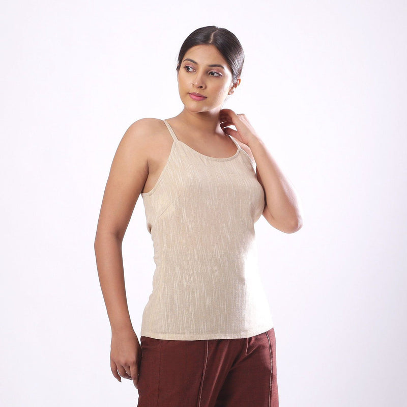 Right View of a Model wearing Solid Beige Cotton Flax Spaghetti Top