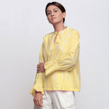 Front Detail of a Model wearing Yellow Hand Tie Dyed Shirred Blouson Top