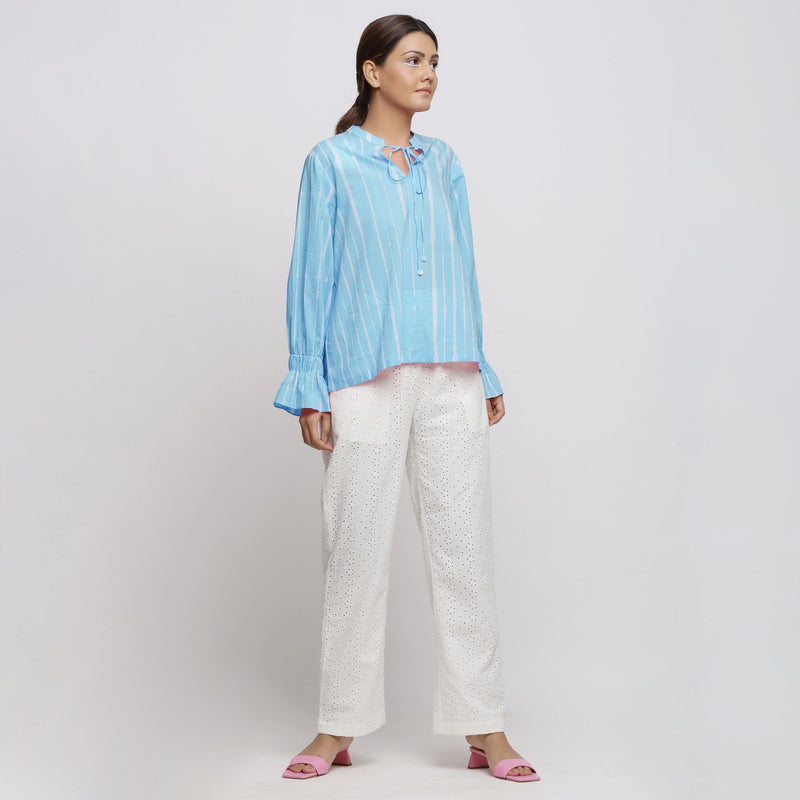 Front View of a Model wearing Blue Shirring Cotton Blouson Top and White Elasticated Pant Co-ord Set