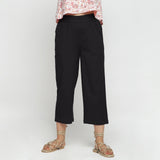 Front View of a Model wearing Solid Black Cotton Flax Culottes