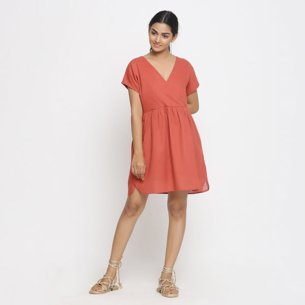 Front View of a Model wearing Brick Red Cotton Solid Wrap Dress