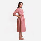 Right View of a Model wearing Solid Brown Tie Up Cotton Wrap Dress