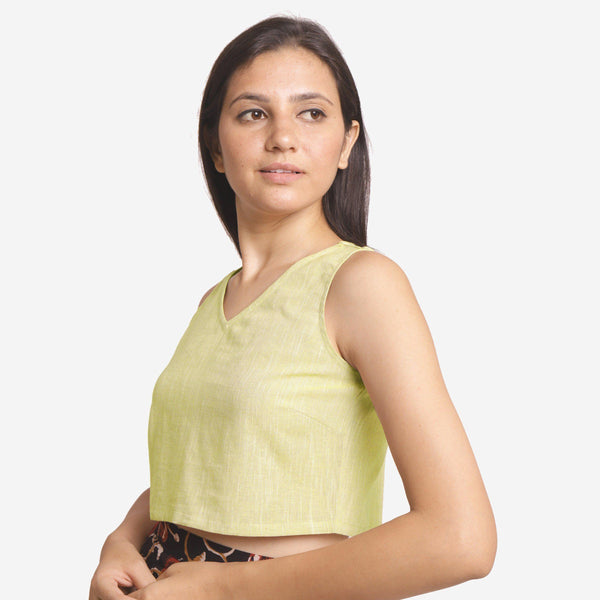 Left View of a Model wearing Solid Lemon Yellow Yarn Dyed Cotton Crop Top