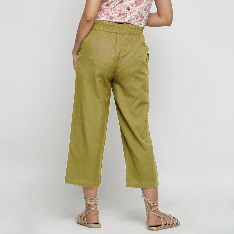 Back View of a Model wearing Solid Olive Green Cotton Flax Culottes