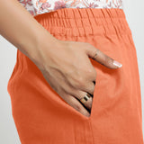 Right Detail of a Model wearing Solid Peach Cotton Flax Culottes