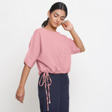 Right View of a Model wearing Solid Pink Cotton Flax Blouson Top