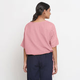 Back View of a Model wearing Solid Pink Cotton Flax Blouson Top
