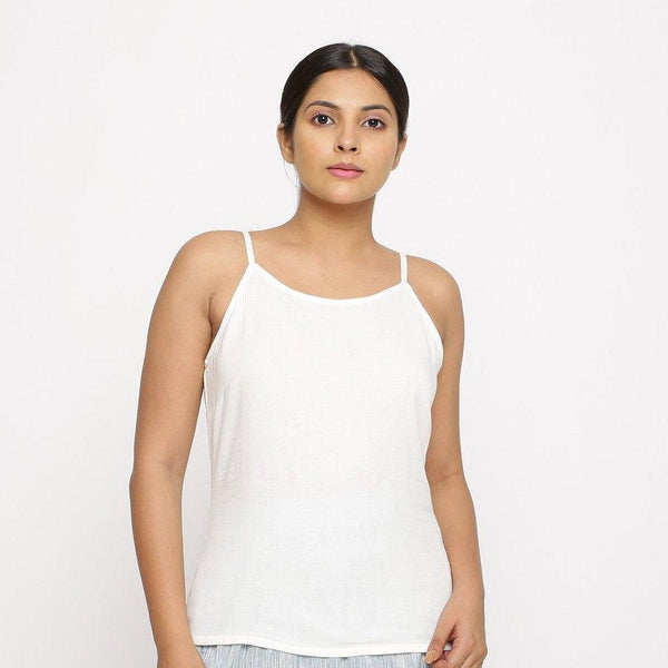 Front View of a Model wearing Solid White Cotton Moss Spaghetti Top