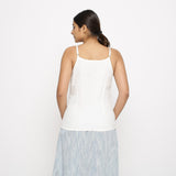 Back View of a Model wearing White 100% Cotton Relaxed Fit Spaghetti Top
