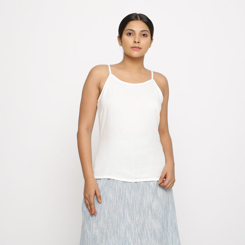 Front View of a Model wearing White 100% Cotton Relaxed Fit Spaghetti Top