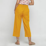 Back View of a Model wearing Solid Yellow Cotton Flax Culottes