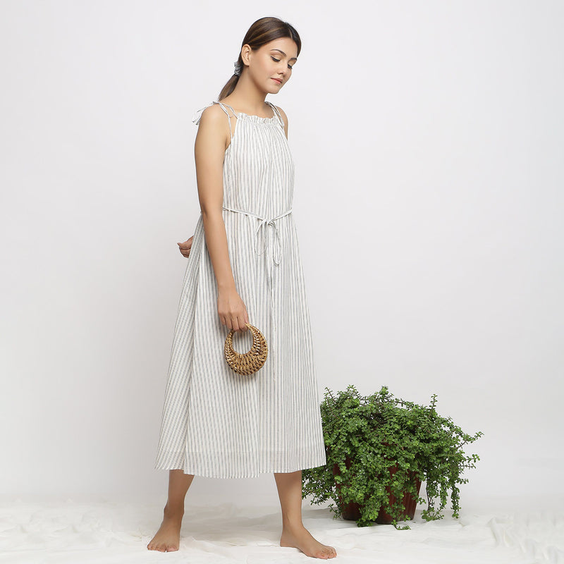 Right View of a Model wearing Strappy Handspun Flared Maxi Dress