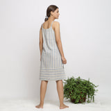 Back View of a Model wearing Strappy Handspun Striped Shift Dress
