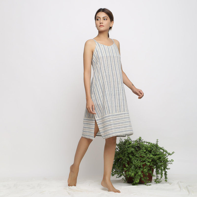 Right View of a Model wearing Strappy Handspun Striped Shift Dress