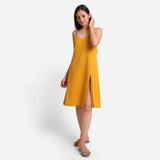 Front View of a Model wearing Mustard Cotton Flax Strappy Slit Dress