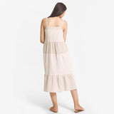 Back View of a Model wearing Strappy Yarn Dyed Cotton Tier Dress