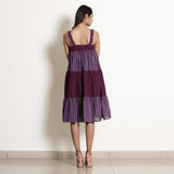 Back View of a Model wearing Berry Wine Striped Cotton Knee Length Tier Dress