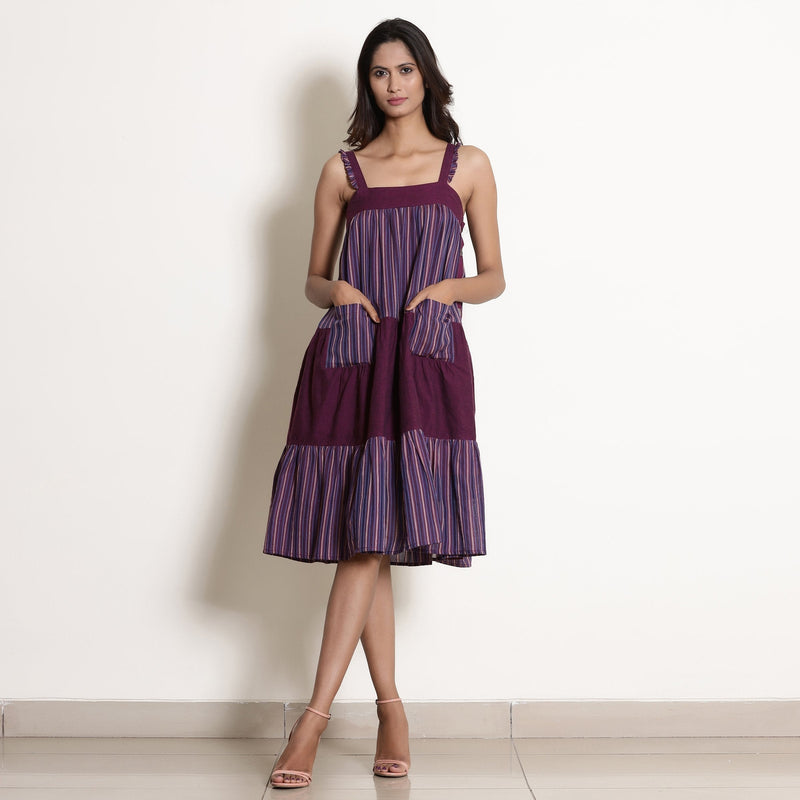 Front View of a Model wearing Berry Wine Striped Cotton Knee Length Tier Dress