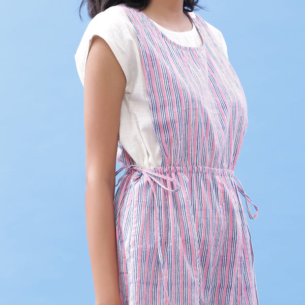 Front Detail of a Model wearing Striped Block Printed Tie Up Pinafore Jumpsuit