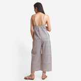 Back View of a Model wearing Striped Block Print Cotton Camisole Midi Jumpsuit