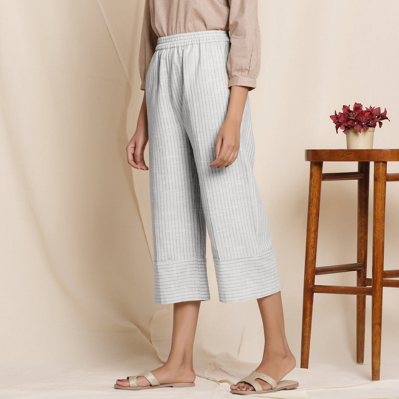 Left View of a Model wearing Striped Cloudy Grey Elasticated Cotton Pant