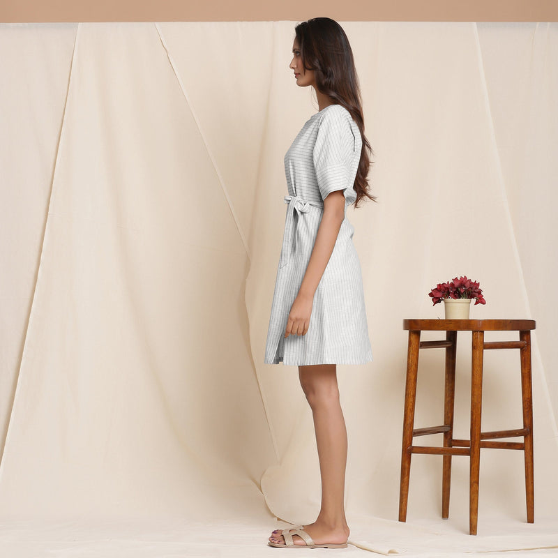Left View of a Model wearing Striped Cloudy Grey Sack Cotton Dress