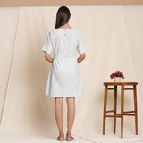 Back View of a Model wearing Striped Cloudy Grey Sack Cotton Dress